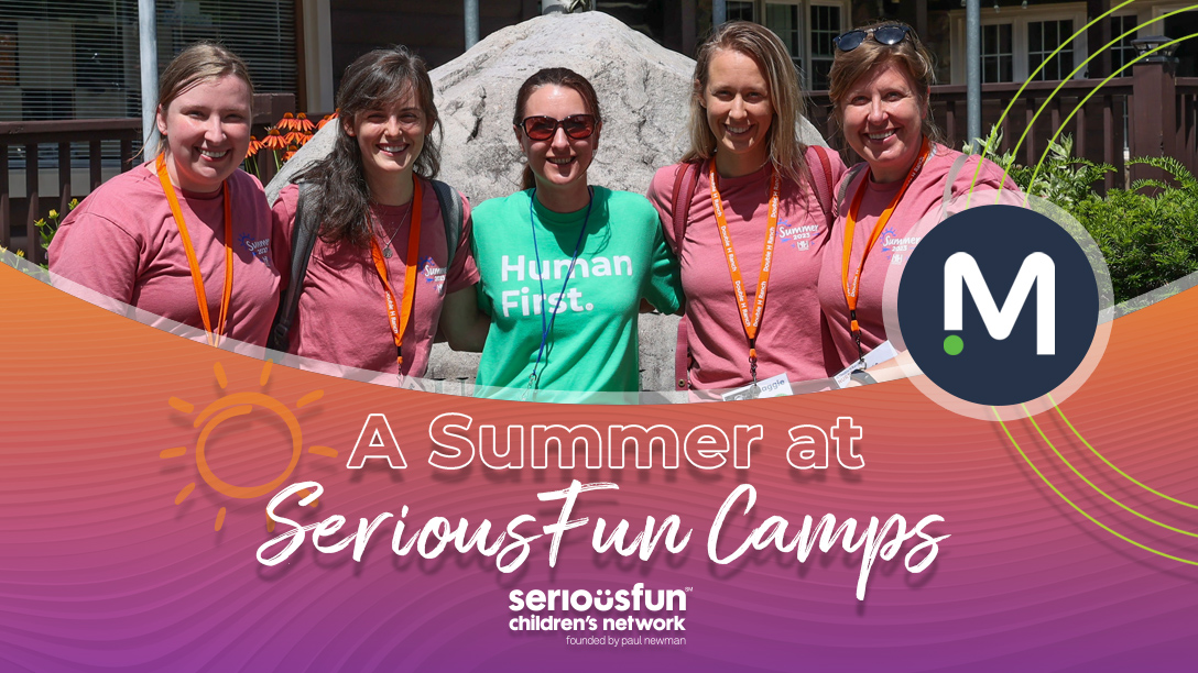 Five women standing in front of a summer camp